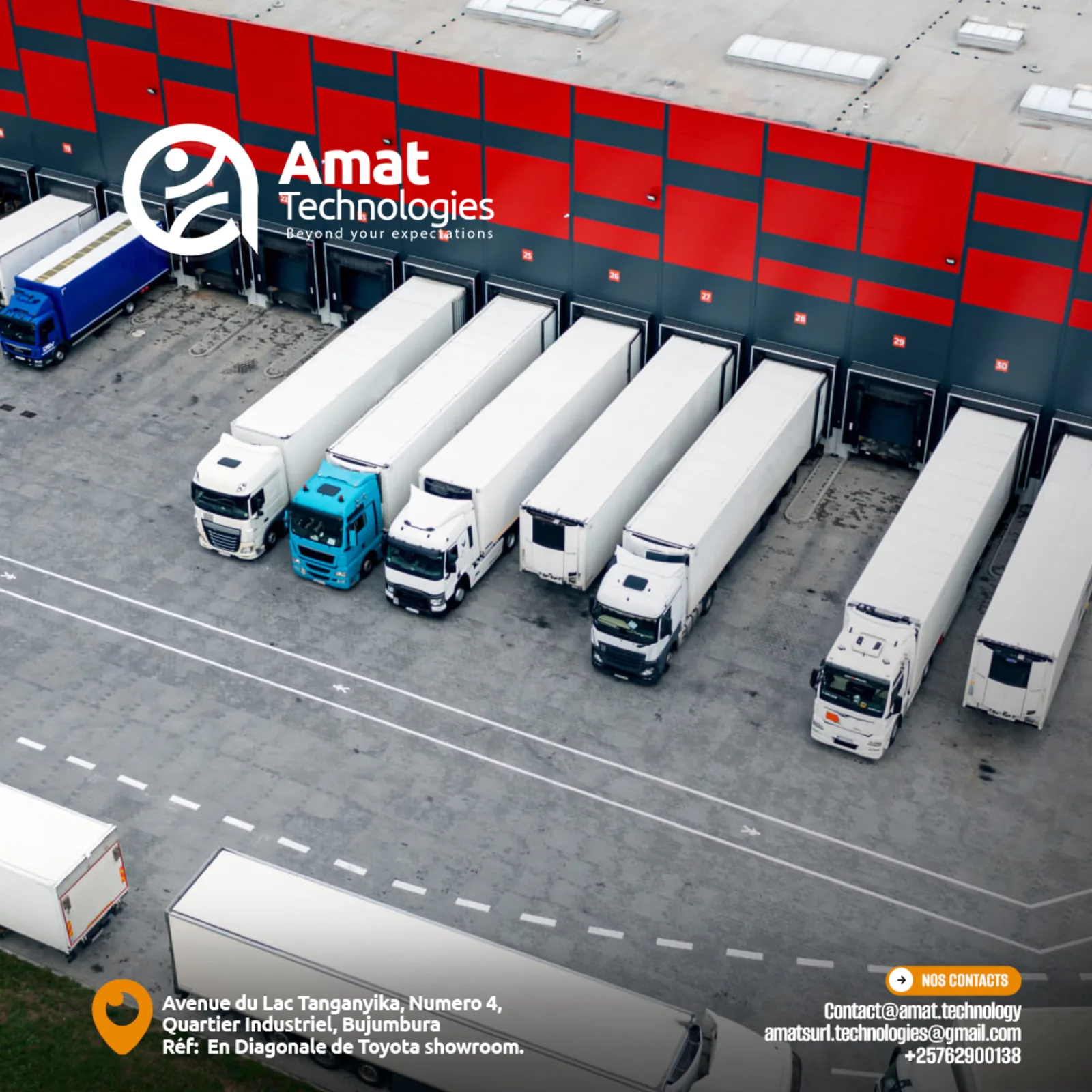 Aerial view of trucks at warehouse loading docks under digitised fleet control